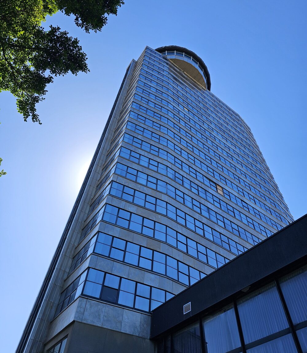 Commercial office tower representing the enterprise and property side of the business